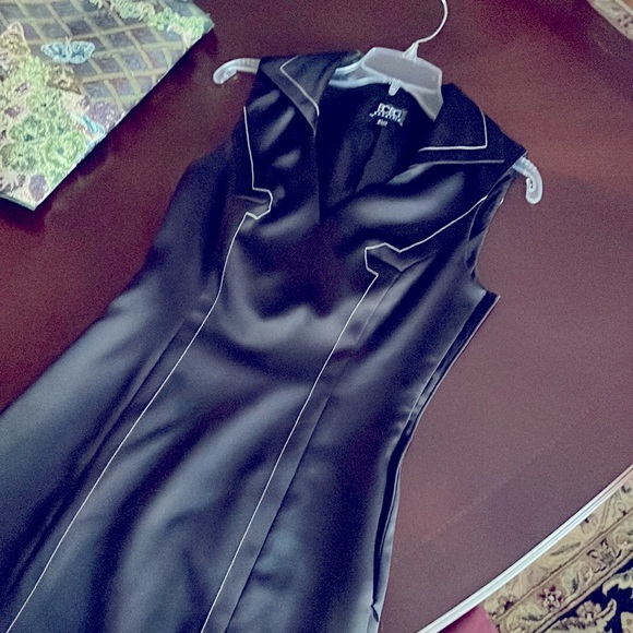 Beautiful BCBG satin finish lined dress.  This is a classy fitted dress. - Picture 1 of 2